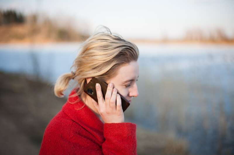 Woman talking on the phone.