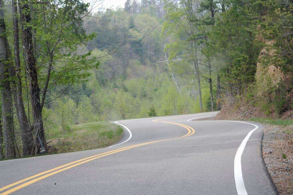 A tranquil ribbon of road. The only thing missing is the whine of turbo in second gear, the revs of the engine, and the tires sticking to the road. No squealing, just gripping.