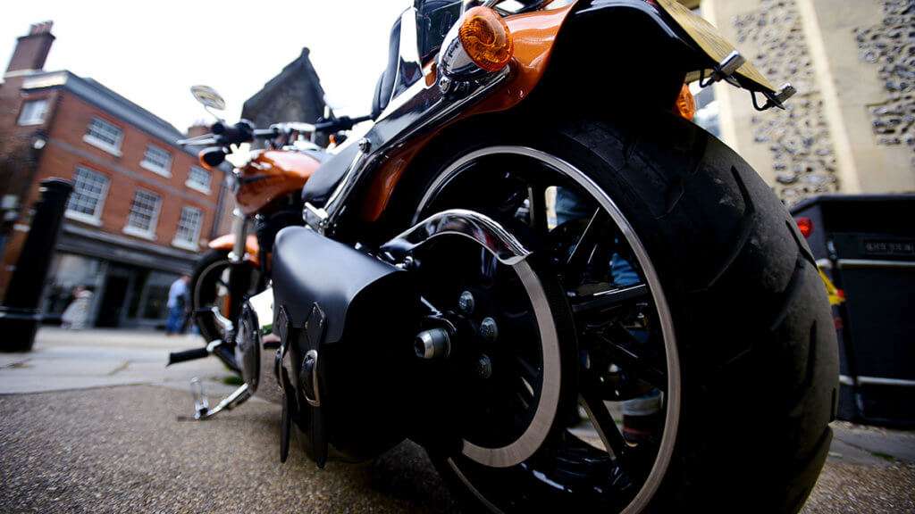 Rear tire on an orange chopper