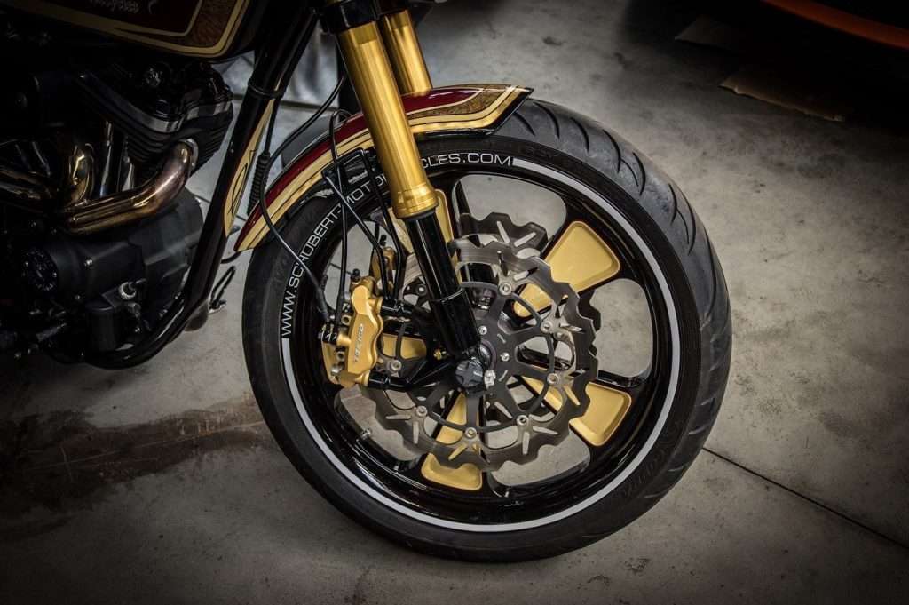 Motorcycle front wheel with suspension