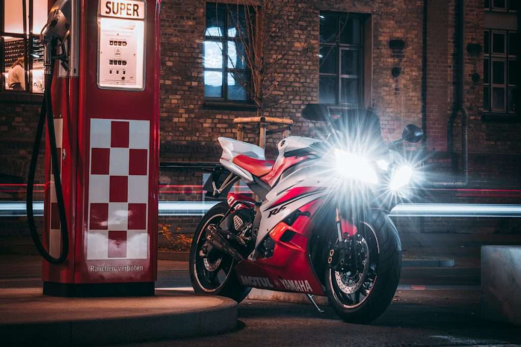 Red Yamaha R6 with both lights on