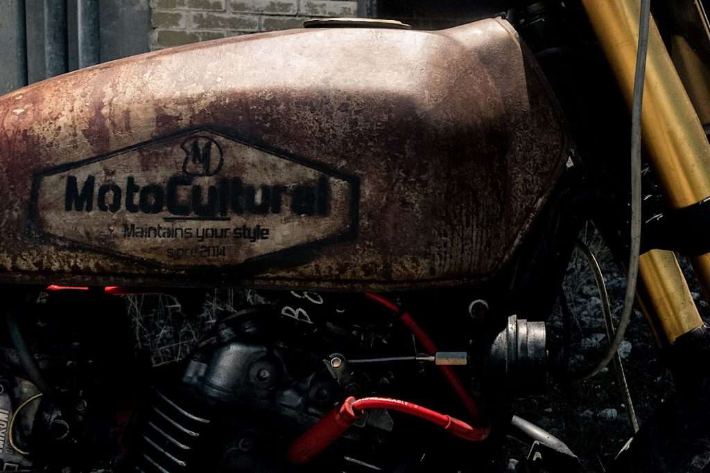 close-up of a rusty motorcycle gas tank