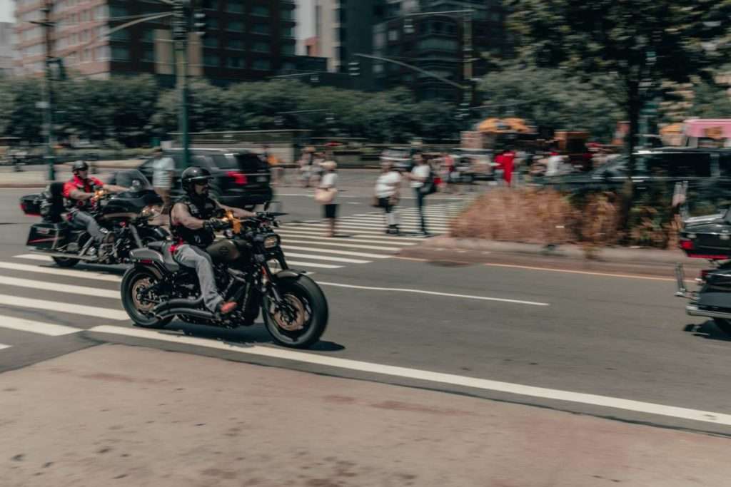 two motorcycle riders in the city