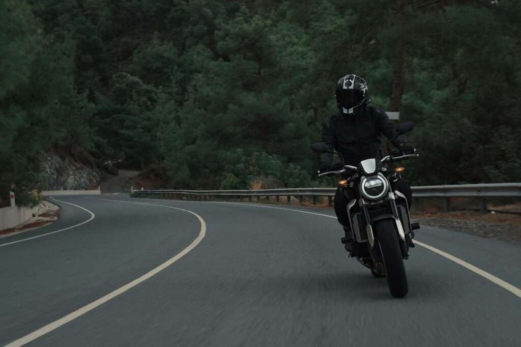 Motorcycle rider alone on the road