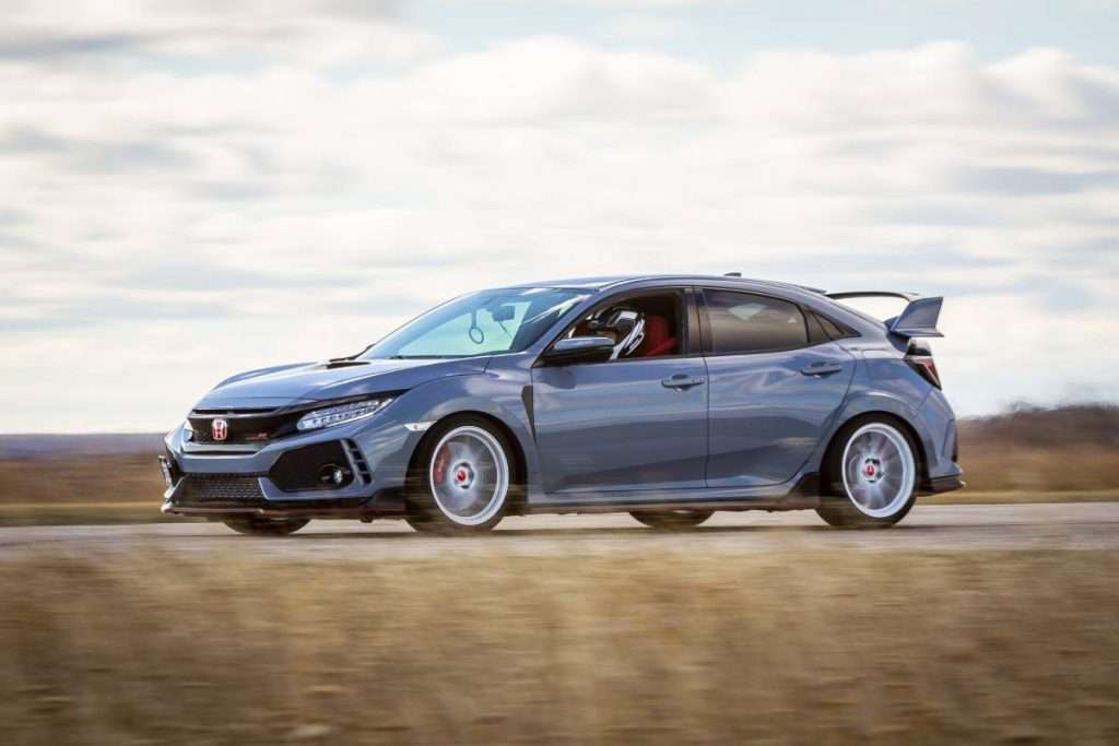 Blue Honda Civic Type-R speeding with a pilot wearing a helmet