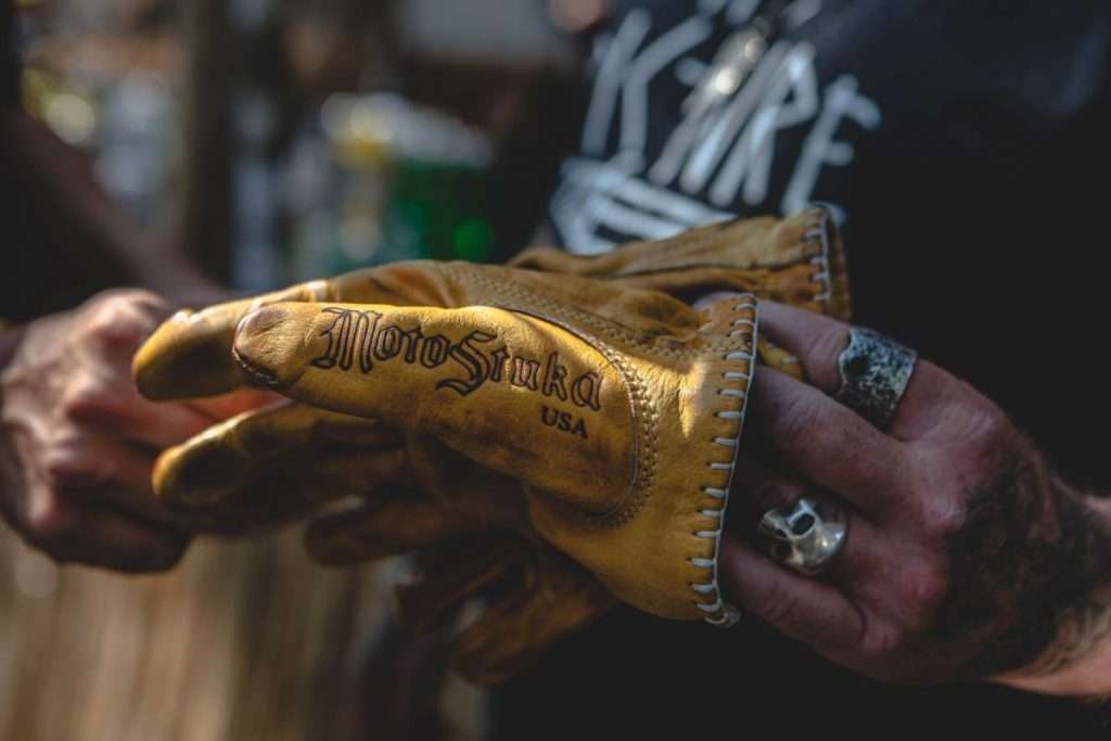 Close-up of brown leather MotoStuka Motorcycle gloves